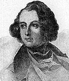 Engraved portrait of Dickens as a young man looking to his right. He has a large forehead and longish curly dark hair, parted on the right. He is wearing a jacket with wide lapels and an open front over a vest.