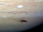 A meteorite scar on Jupiter, as seen by the Hubble Space Telescope.