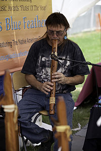 Douglas Blue Feather on Traditional Flute (5744908734).jpg