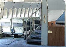  A spiral staircase on 747-100s and −200s that leads to the upper deck