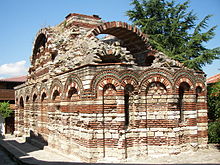 Apse view of a richly decorated yet partially preserved medieval Orthodox church