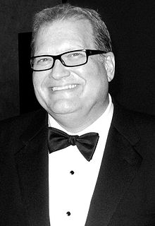 A smiling Drew Carey in a tuxedo and bow tie.