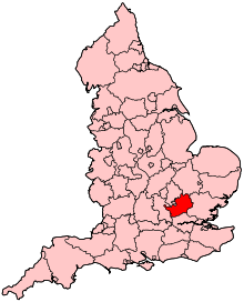 A small county slightly to the south and east of the centre of the country, and completely bounded by other counties.