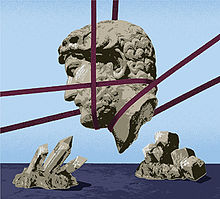 The head of a statue facing left, supported by purple cables in mid-air, is set against a pale blue sky and is the centre of the picture. Below it in the dark blue foreground are crystalline rocks, which point towards the head.