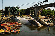 Navy recovery operation on the bank of the Mississippi with the twisted wreckage
