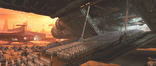 Numerous rows of soldiers walking out of a large spaceship