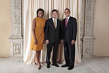 President Barack Obama and First Lady Michelle Obama pose for a photo during a reception at the Metropolitan Museum in New York with Jan Peter Balkenende, 23 September 2009.