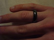  A smooth circular band of magnetite on a finger.