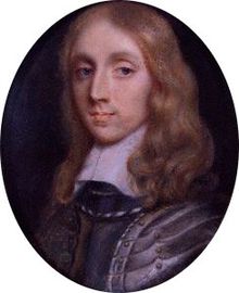 A circular portrait of Richard Cromwell.  Cromwell has shoulder length blonde hair and is wearing silver armour.
