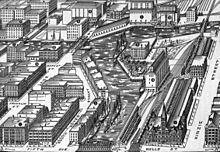 19th century black and white lithograph print showing a river lined with industrial buildings and railroads