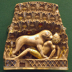 Nimrud ivory lion eating a man.jpg