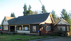 Front exterior photograph of the historic Vernonia Pioneer Museum building.