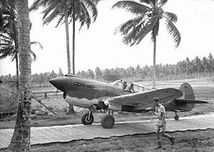 Sqn Ldr Keith "Bluey" Truscott, CO of 76 Squadron, taxiing along Marston Matting at Milne Bay in September 1942
