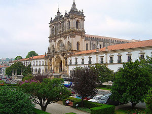 Façade of the Monastery of Alcobaça. The portal and rose window of the church are original gothic (early 13th century), while the towers are baroque (18th century).