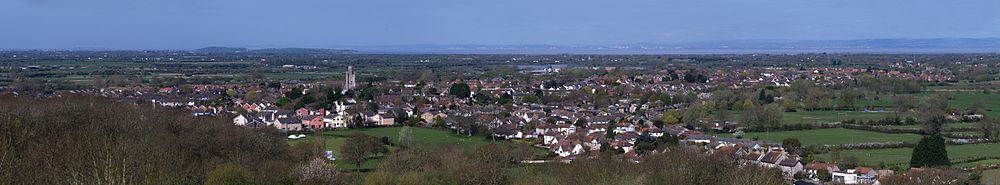 Panoramic view of the village of Yatton from Cadbury Hill, showing the North Somerset levels and the Severn Estuary in the distance