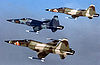 Formation of three aggressor F-5E aircraft 061006-F-1234S-072.jpg