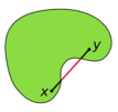 Illustration of a non-convex set, which looks somewhat like a boomerang or cashew nut. A (green) non-convex set contains the (black) line-segment joining the points x and y. Part of the line segment lies outside of the (green) non-convex set.
