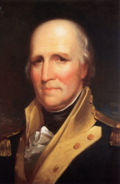 Painting of the head and shoulders of an older, gray-haired, balding man in a colonial-era military uniform (blue jacket with white lapels and gold epaullettes