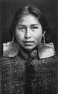 Kwagu'ł girl, Margaret Frank (nee Wilson) wearing abalone shell earings. Abalone shell earings were a sign of nobility and only worn by members of this class.