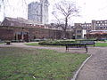 Marshalsea wall from the garden side, showing coroner's court on the right.jpg