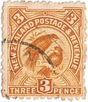 Orange-coloured postage stamp with a central picture of two birds
