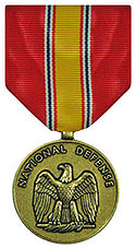 The obverse view of the medal shows the American bald eagle, perched on a sword and palm. Above this, in a semicircle, is the inscription National Defense.