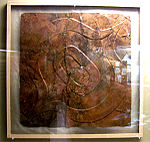 Ogee motif-repousse copper plate from the Etowah Site