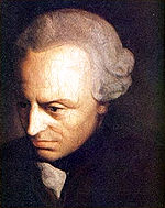 Head of a man viewed from his upper left so that his brightly lit left forehead, receding hairline, and sharp nose dominate the image. He looks downward with a serious expression. He wears a modestly sized 18th-century-style wig and something small and white at his throat; the rest of his clothing is so black that it merges into the black background.