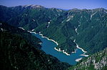 Kurobe Dam and Mount Yakushi from Mount Subari 2001-09-23.jpg