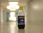 Pepsi-Cola in a plastic bottle.