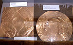 two replica repousse copper plates from Spiro