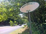 Narragansett Trail "white oval" sign on CT Route 2 near Gallup Pond and Ryder Road.