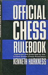 A photo of the book "Official Chess Rulebook" by Kenneth Harkness