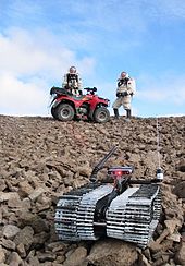 The DARPA - US Army telerobot "Solon" and Crew 3 explore Devo Rock canyon on July 26, 2001.
