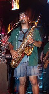 Guy in a Skirt playing a Saxophone.jpg