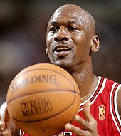 Michael Jordan holding a basketball