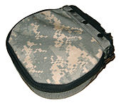 a canvas pouch in universal camouflage pattern with a zipper and metal clip for mounting to the M249.
