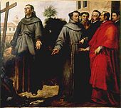 Man in his twenties or thirties standing transfixed in front of a cross his height, five onlookers