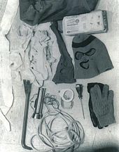 The murder kit includes a sports bag, garbage bags, ski mask, nylon stocking with holes, flashlight, crowbar, an ice pick, and some gloves.
