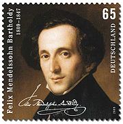 postage stamp showing on a dark background a head-and-shoulders portrait of a dark-haired, narrow faced, middle-aged man looking out at the viewer, weating a high collar and dark coat; text comprises 'Felix Mendelssohn Bartholdy', the dates 1809–1847, a facsimile of Mendelssohn's signature,the figure 65 and the word 'Deutschland'