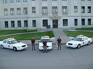 Dodge County Sheriff's Office (Nebraska) deputies, with vehicles.jpg