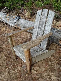 A weathered Adirondack chair