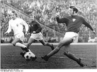 Raugust (left) in a 1975 match against Dynamo Berlin