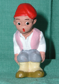 A traditional Catalan caganer from the front.