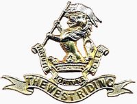 DWR Cap Badge Brass.jpg
