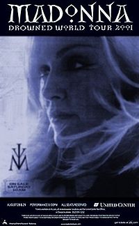 Left profile of a blond woman. Her eyes and brows are kohl lined and her blond locks are windswept. The image is washed in blue. Above the picture is a black box where the words "Madonna" and "Drowned World Tour 2001" are written in white calygraphic fonts.