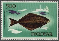 Photo of a stamp displaying a painting of the brown side of a halibut