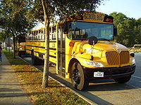 A CE300 school bus made by IC Corporation transporting Houston ISD students.
