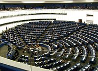 Hemicycle of European Parliament, Strasbourg, with chamber orchestra performing-cropped.jpg