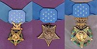 Three medals, side by side, consisting of an inverted 5-pointed star hanging from a light blue ribbon with 13 white stars in the center. Medal on the left has a laurel wreath around the star and an eagle emblem above the star, middle medal has an anchor emblem attaching the medal to the ribbon, rightmost medal has a laurel wreath around the star and an emblem with wings, lightening bolts, and the word "VALOR" connecting the medal to the ribbon.